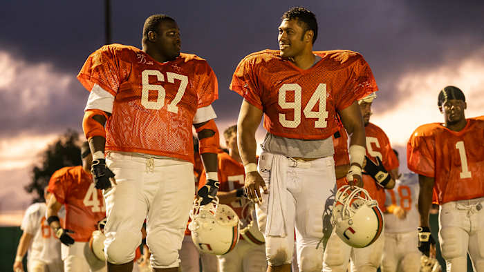 Production still of Wavyy Jonez and Uli Latukefu NBC's "Young Rock"